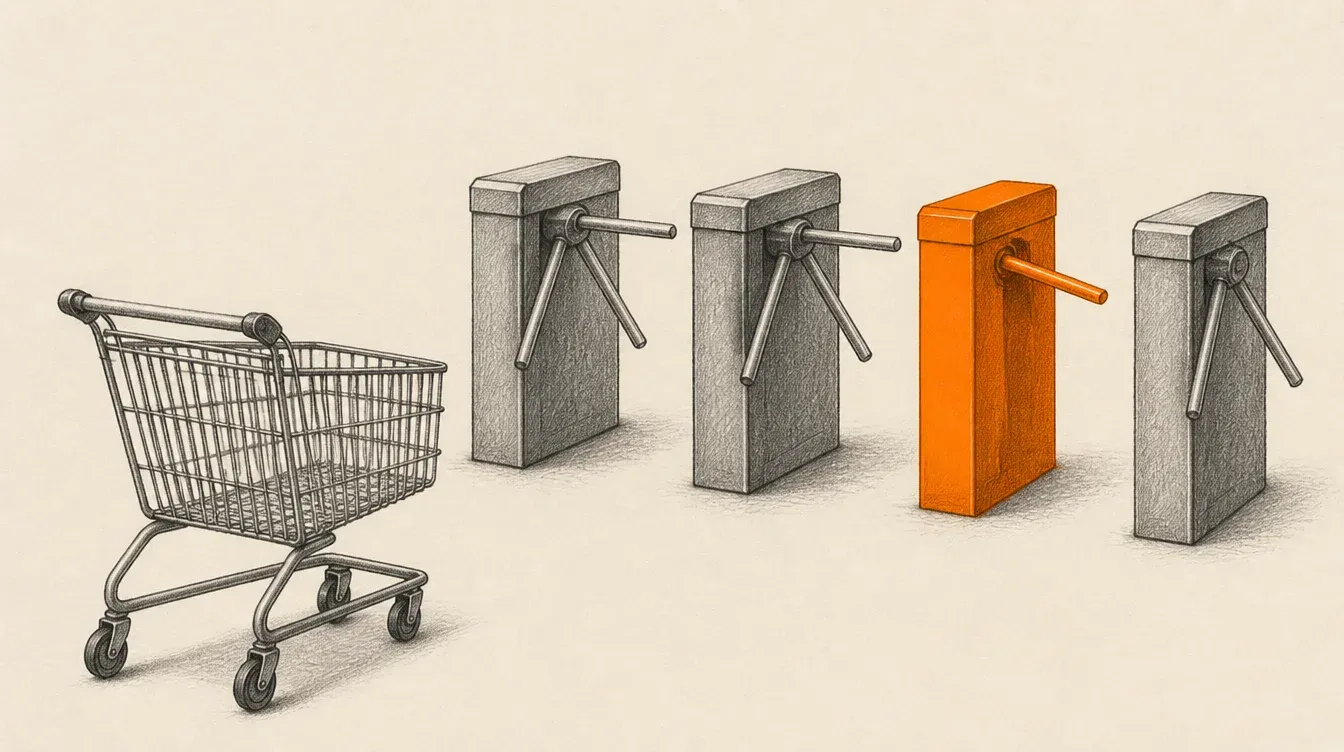 A graphite shopping cart facing four turnstiles in a row, three shut and grey, one open and marked in solid orange